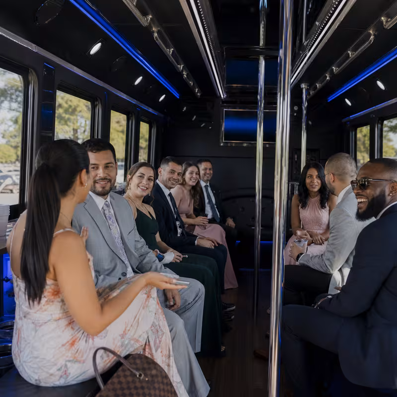 Wedding guests seated inside a Pembroke Pines party bus