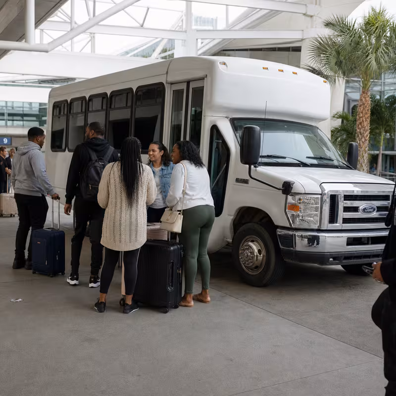 Black Mercedes Sprinter van staged for an Pembroke Pines Airport Transportation group