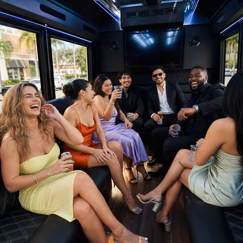 Party bus interior with wraparound leather seating and LED lighting in Pembroke Pines