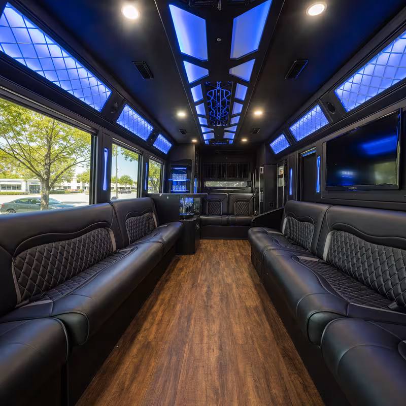 Party bus interior with wraparound leather seating and LED lighting in Pembroke Pines