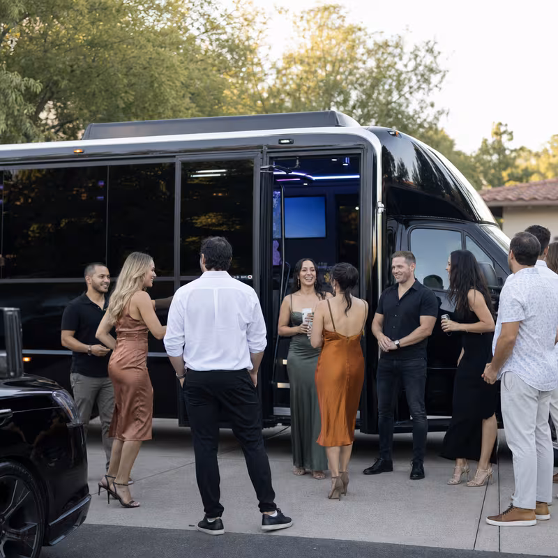 Passengers loading luggage while boarding an Pembroke Pines group shuttle