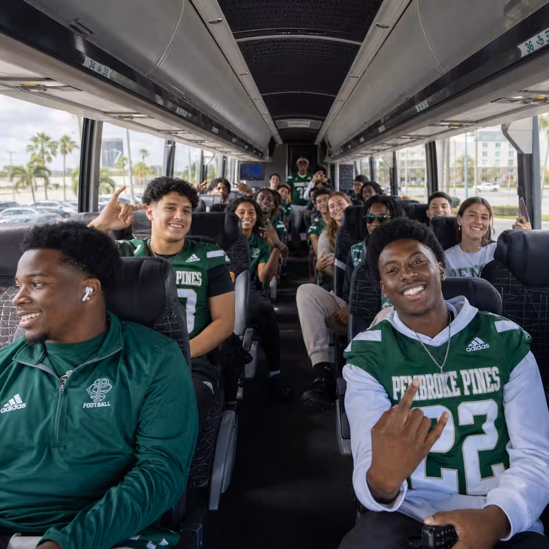 Black Mercedes Sprinter van staged for an Pembroke Pines Sporting Event Transportation group