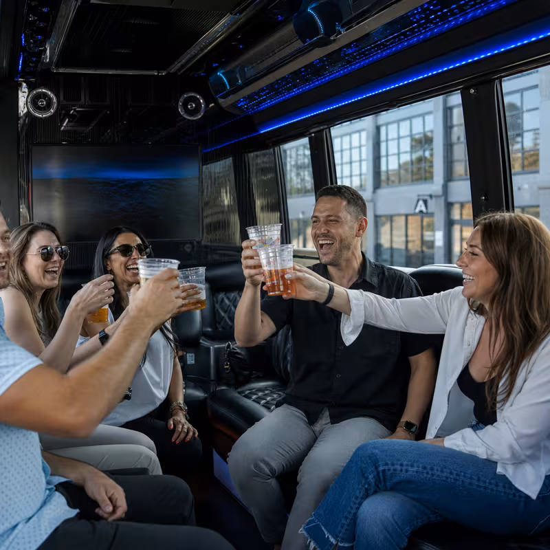 Group boarding a white charter bus for Winery & Brewery Tour Transportation transportation in Pembroke Pines